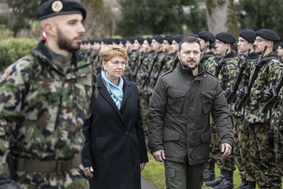 Swiss Federal President Viola Amherd, left, and her guest, Volodymyr Zelenskyy, President of Ukraine, inspect the guard of honour, on Monday, January 15, 2024 in Kehrsatz near Bern, Switzerland. Zelen ...