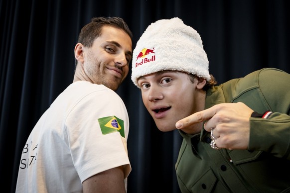Skiracer Lucas Pinheiro Braathen of Brazil poses next to a brazilian flag during a press conference at the FIS Alpine Skiing World Cup season opener, in Soelden, Austria, Thursday, October 24, 2024. ( ...
