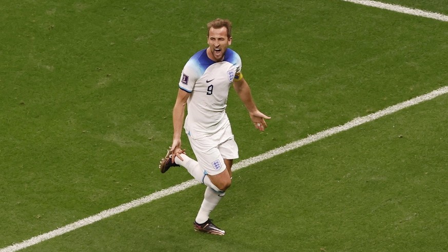 epa10348671 Harry Kane of England celebrates scoring the 2-0 goal during the FIFA World Cup 2022 round of 16 soccer match between England and Senegal at Al Bayt Stadium in Al Khor, Qatar, 04 December  ...