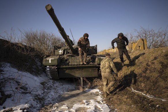 Ukrainian servicemen of the 3rd Separate Tank Iron Brigde take part in an exercise in the Kharkiv area, Ukraine, Thursday, Feb. 23, 2023, the day before the one year mark since the war began. War has  ...