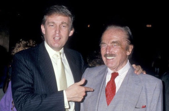 View of, from left, Donald Trump, Jr. (seated), his parents Ivana Trump (1949 - 2022) (in pink, facing away) and Donald Trump, Milos Zelnicek (1927 - 1990) (Ivana’s father) (seated, center), Fred Trum ...