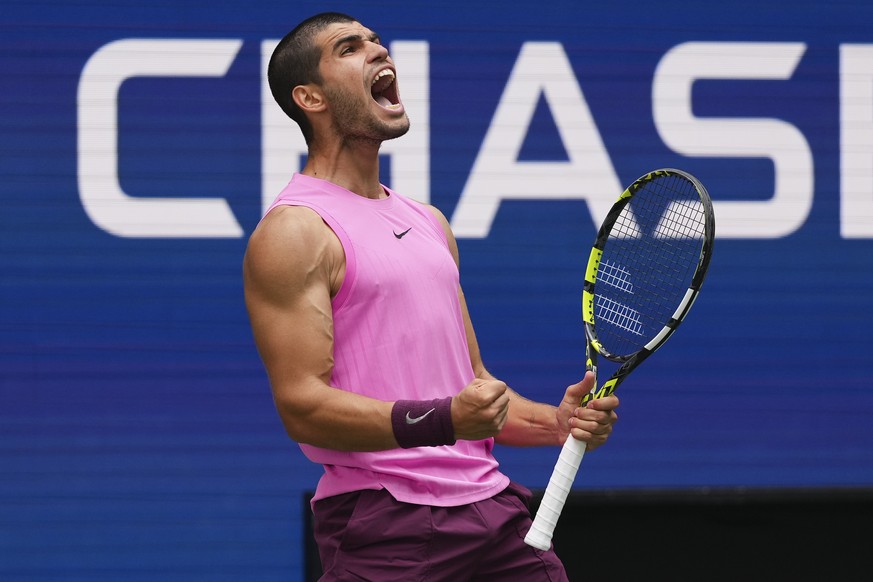 Carlos Alcaraz, of Spain, reacts after defeating Jiri Lehecka, of the Czech Republic, during the quarterfinal round of the U.S. Open tennis championships, Tuesday, Sept. 2, 2025, in New York. (AP Phot ...
