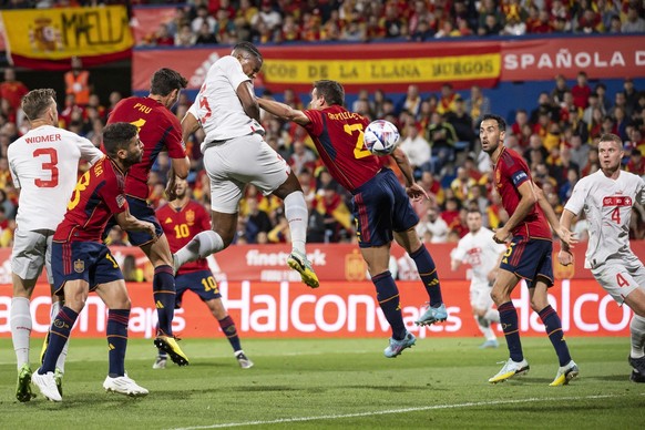 Switzerland&#039;s defender Manuel Akanji, center left, scores with a header against Spain&#039;s defender Cesar Azpilicueta to 0:1, during the UEFA Nations League group A2 soccer match between Spain  ...