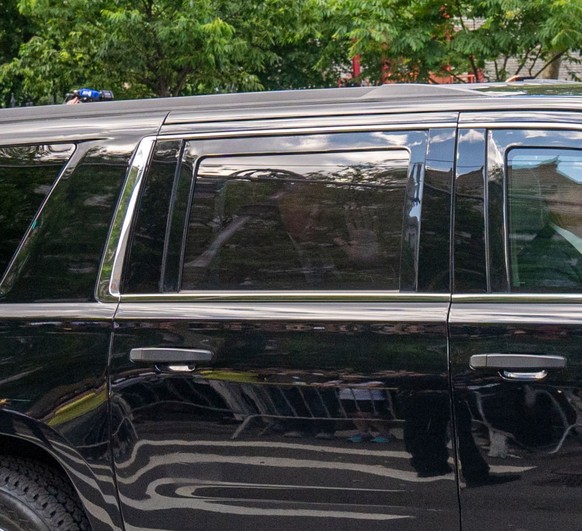 NEW YORK, NEW YORK - MAY 30: Former President Donald Trump waves to supporters from a Secret Service vehicle after he was found guilty on all counts at Manhattan Criminal Court on May 30, 2024 in New  ...
