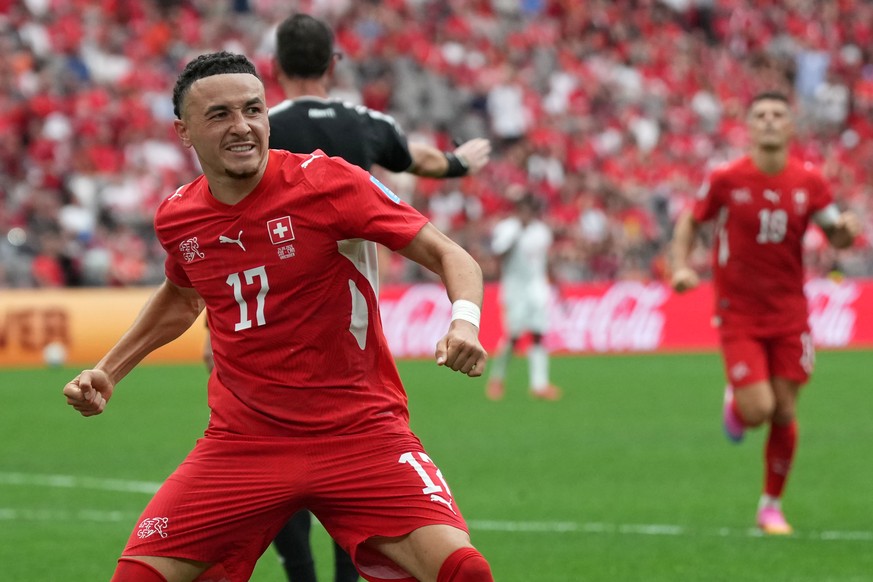 Switzerland's Ruben Vargas (17) celebrates after scoring during the World Cup Group B soccer match between Switzerland and Canada in Vancouver, British Columbia, Wednesday, June 24, 2026. (AP Pho ...