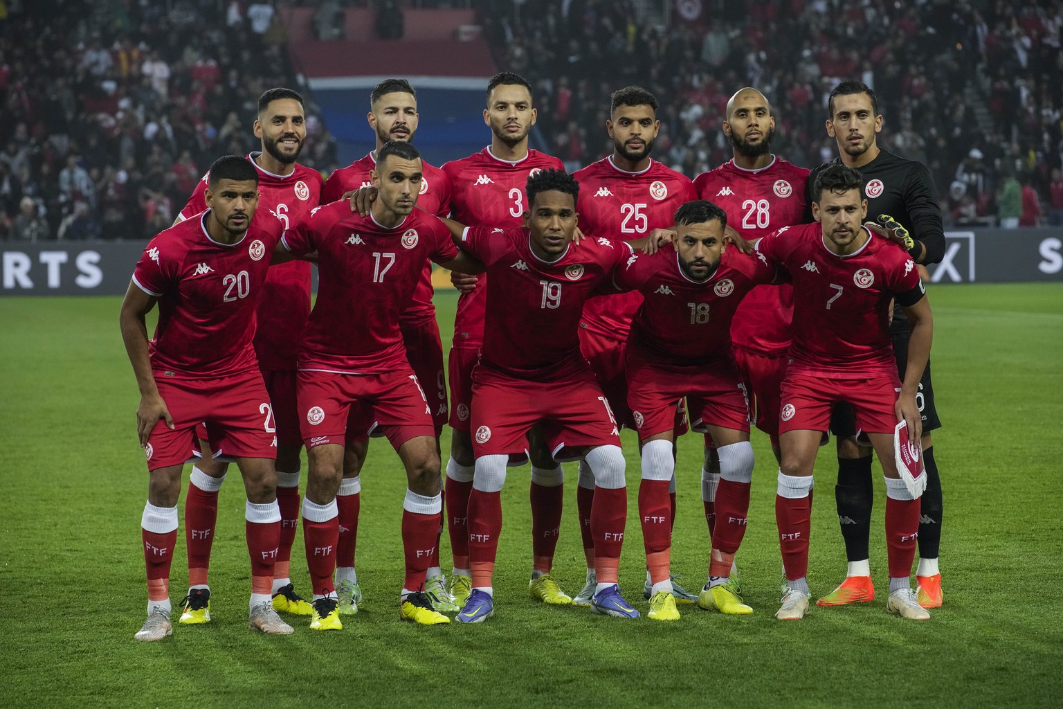 Tunisia players pose for a team picture during the international friendly soccer match between Brazil and Tunisia at the Parc des Princes stadium in Paris, France, Tuesday, Sept. 27, 2022. (AP Photo/C ...