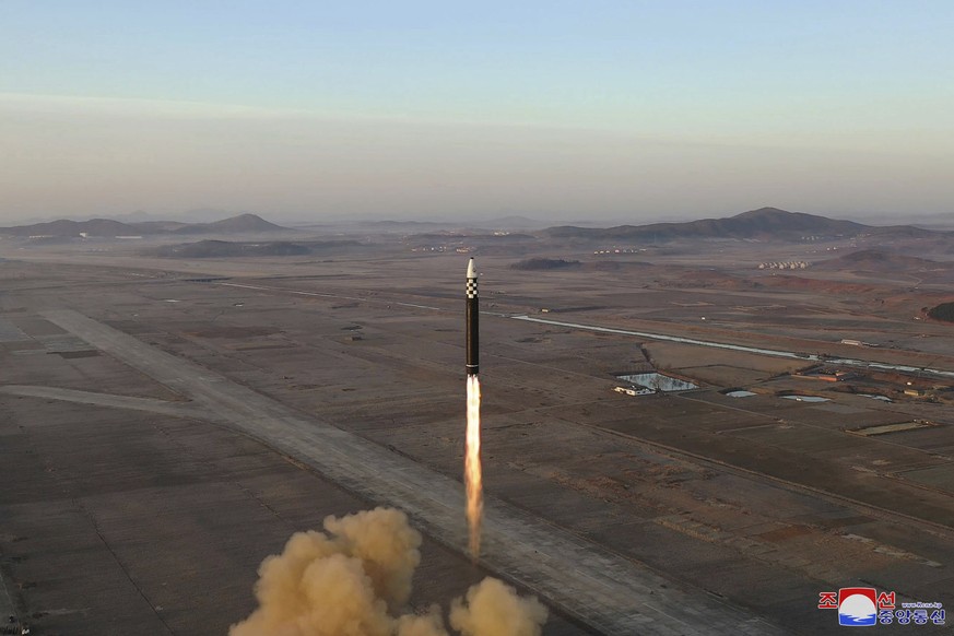 This photo provided by the North Korean government shows what it says is an intercontinental ballistic missile in a launching drill at the Sunan international airport in Pyongyang, North Korea, Thursd ...