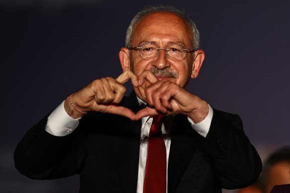 epa10623464 Turkish presidential candidate Kemal Kilicdaroglu, leader of the opposition Republican People&#039;s Party (CHP) greets his supporters during his elections campaign rally in Ankara, Turkey ...