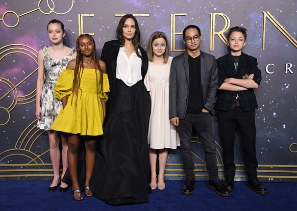 LONDON, ENGLAND - OCTOBER 27: (L-R) Shiloh Jolie-Pitt, Zahara Jolie-Pitt, Angelina Jolie, Vivienne Jolie-Pitt, Maddox Jolie-Pitt and Knox Jolie-Pitt attend the "The Eternals" UK Premiere at  ...
