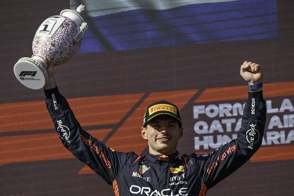epa10764423 Red Bull driver Max Verstappen of the Netherlands celebrates on the podium after winning the Hungarian Formula One Grand Prix at the Hungaroring circuit, in Mogyorod, near Budapest, Hungar ...