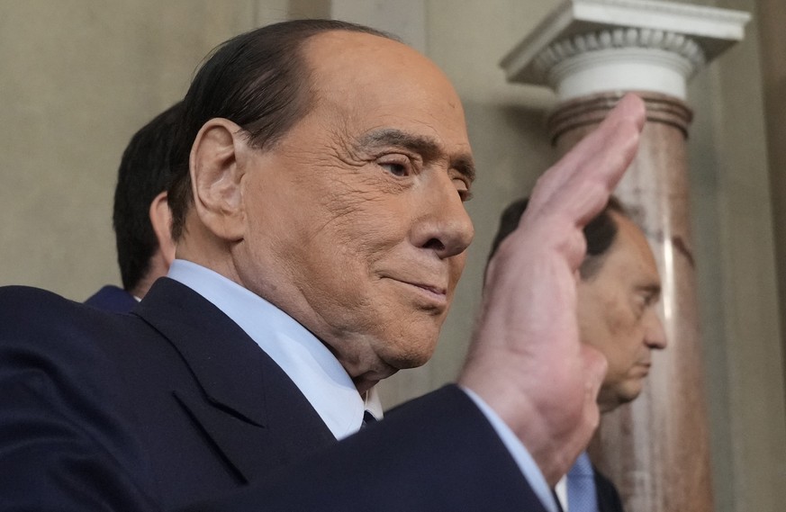 FILE - Forza Italia president Silvio Berlusconi waves to the press as he leaves the Quirinale Presidential Palace in Rome, on Oct. 21, 2022. Former Italian Premier Silvio Berlusconi has been admitted  ...