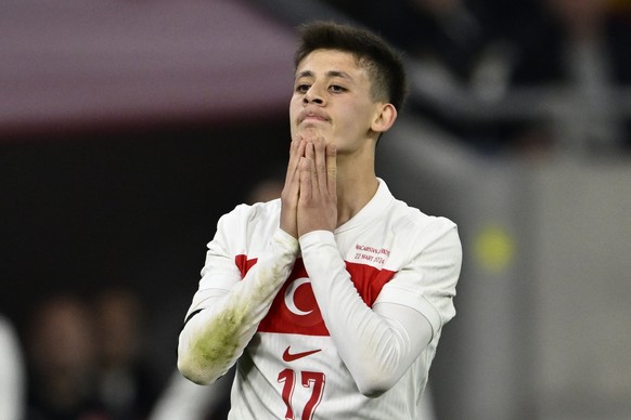 Turkey&#039;s Arda Gueler reacts during the international friendly soccer match between Hungary and Turkey at the Puskas Arena in Budapest, Hungary, Friday, March 22, 2024. (AP Photo/Denes Erdos)