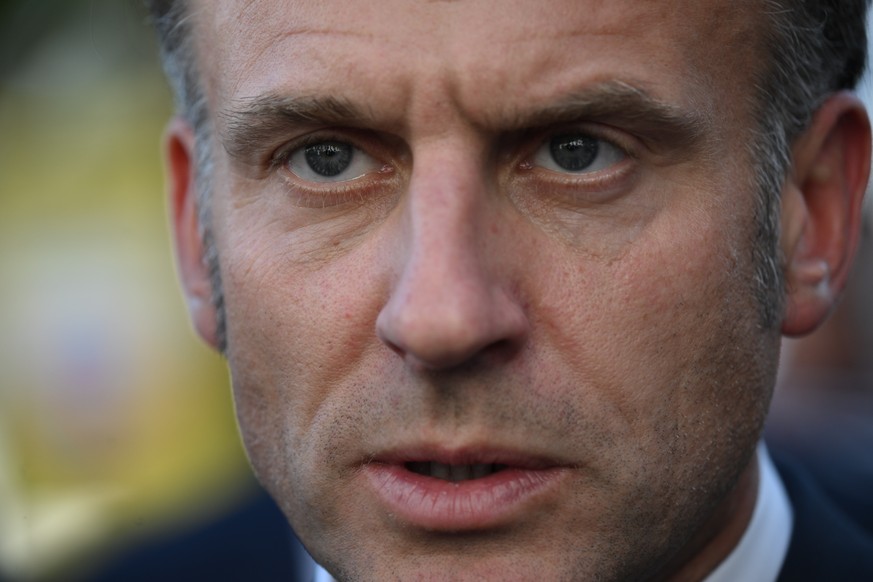 epa12241642 France&#039;s President Emmanuel Macron talks to participants in the Plan Avenir Lourdes (PAL), launched in 2021 to offset the effects of the health crisis, at the start of a two-day trip  ...