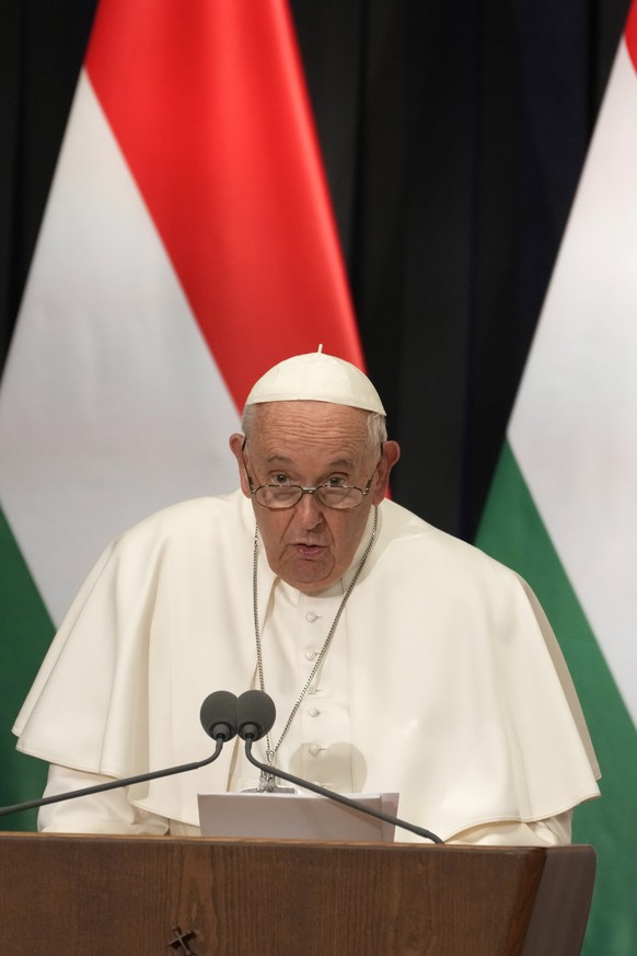 Pope Francis delivers his speech during a meeting with the authorities, civil society, and the diplomatic corps in the former Carmelite Monastery in Budapest, Hungary, Friday, April 28, 2023. The Pont ...