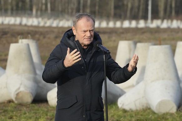 Poland&#039;s Prime Minister Donald Tusk speaks to reporters in Dabrowka, Poland, during a visit to Poland&#039;s border with Russia on Saturday Nov. 30, 2024. (AP Photo/Czarek Sokolowski)