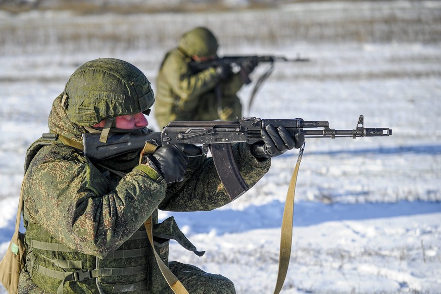 Russian soldiers take part in drills at the Kadamovskiy firing range in the Rostov region in southern Russia, Wednesday, Dec. 22, 2021. Russia&#039;s top diplomat says that Russian and U.S. negotiator ...