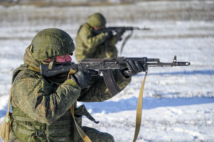 Russian soldiers take part in drills at the Kadamovskiy firing range in the Rostov region in southern Russia, Wednesday, Dec. 22, 2021. Russia's top diplomat says that Russian and U.S. negotiator ...