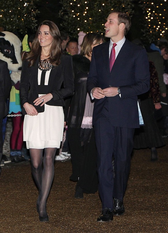 FAKENHAM, ENGLAND - DECEMBER 18: Prince William and finacee Catherine Middleton arrive for a Christmas reception in aid of the Teenager Cancer Trust at theThursford Collection on December 18, 2010 in  ...