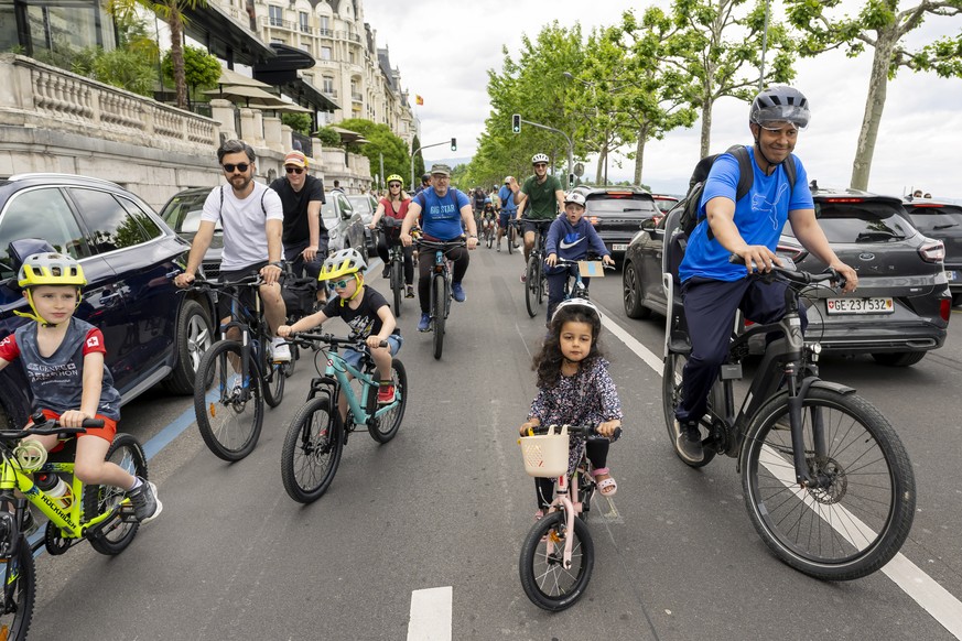 Des personnes participent a la 4e edition de la Kidical Mass, ce dimanche 25 mai 2025 a Geneve. La Kidical mass action et porte par plus 250 organisations, dont Pro velo. Il s'agit d'une par ...