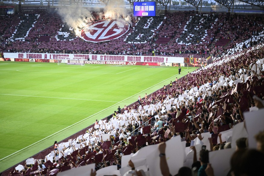 Servette&#039;s supporters cheer in a sould-out stadium before the UEFA Champions League Third qualifying round second leg soccer match between Switzerland&#039;s Servette FC and Scotland&#039;s Glasg ...