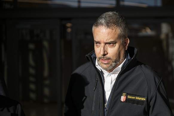 Stephane Ganzer, State Councillor and head of the Department of Security, Institutions and Sport of the Canton of Valais arrives for a press conference after a unidentified origin fire broke out in Cr ...