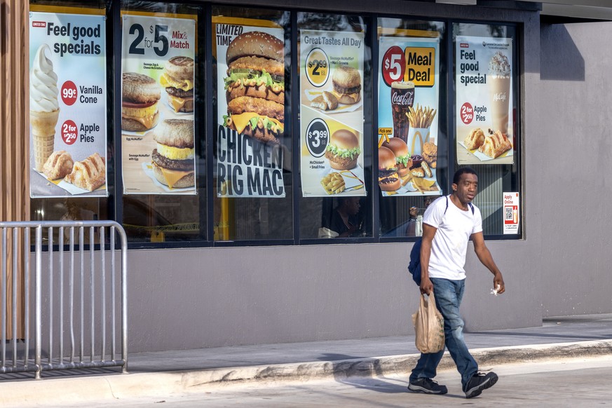 epa11677493 A person leaves a McDonald&#039;s restaurant in Miami, Florida, USA, 23 October 2024. US Centers for Disease Control and Prevention (CDC) has reported an outbreak of E. coli affecting near ...