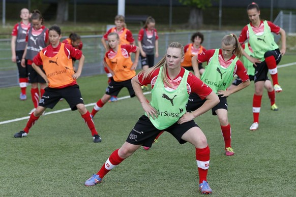 À l'entraînement (au premier plan à droite).