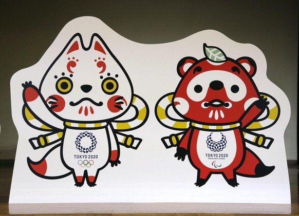 epa06373004 One of three shortlisted mascot design sets of Tokyo 2020 Olympic Games (L) and Paralympic Games is unveiled at an elementary school in Tokyo, Japan, 07 December 2017. The Tokyo Organising ...
