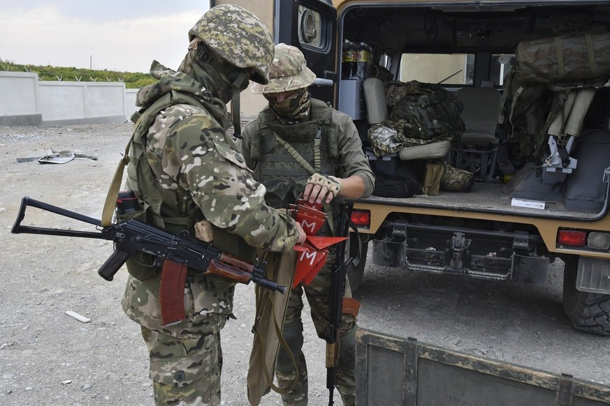 Kyrgyz mine clearing experts prepare their to work to find and defuse mines after fighting between Kyrgyzstan and Tajikistan in Ak-Sai village about 950km (593 miles) southwest of Bishkek the capital  ...