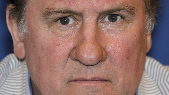FILE - In this Thursday, June 6, 2013 file photo, French actor, filmmaker, businessman and vineyard owner, Gerard Depardieu attends a press conference for the presentation of the first Russian Film Fe ...