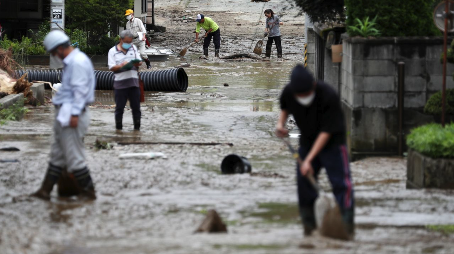 Rue inondée à Oe, dans la préfecture de Yamagata (nord-est du Japon), 04.08.2022.