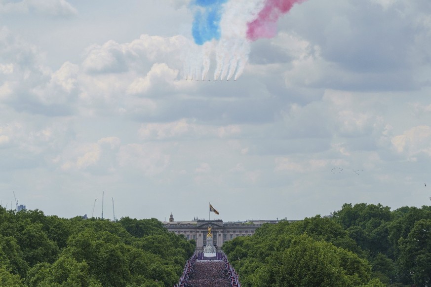 The Red Arrows during a flypast after the Trooping the Colour ceremony in London, Thursday June 2, 2022, on the first of four days of celebrations to mark the Platinum Jubilee.