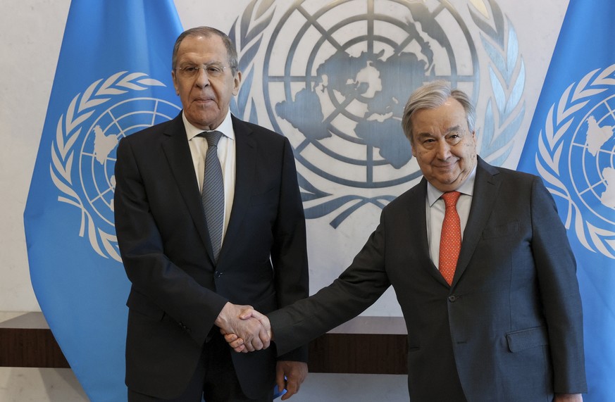 epa10589654 A handout picture made available by Russian Foreign ministry press service shows Russia&#039;s Foreign Minister Sergey Lavrov (L) and United Nations Secretary-General Antonio Guterres (R)  ...