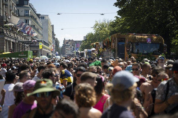 epa13156754 Participants dance through the streets during the 33rd Street Parade in the city center of Zurich, Switzerland, 08 August 2026. The annual dance music event runs this year under the theme  ...