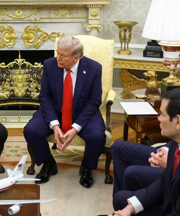 U.S. President Donald Trump and Ukrainian President Volodymyr Zelenskiy meet at the Oval Office of the White House, amid negotiations to end the Russian war in Ukraine, in Washington, D.C., U.S., Augu ...