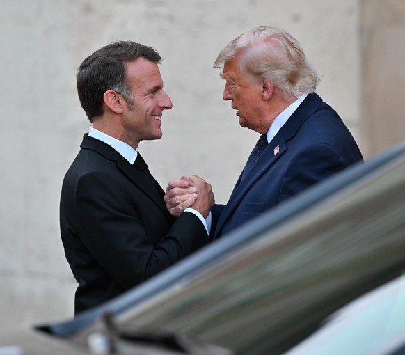 VERSAILLES, FRANCE - JUNE 17: US President Donald Trump (R) and French President Emmanuel Macron (L) attend a dinner at the Palace of Versailles, officially marking the 250th anniversary of US indepen ...