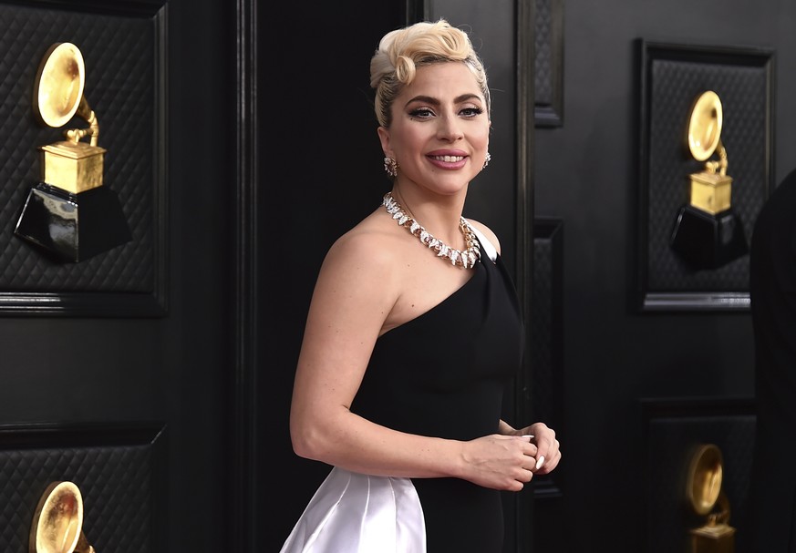 FILE - Lady Gaga arrives at the 64th annual Grammy Awards at the MGM Grand Garden Arena on April 3, 2022, in Las Vegas. Federal authorities are offering a $5,000 reward for information about the man w ...