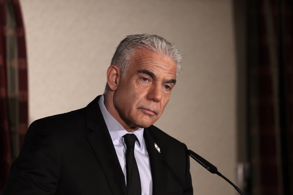 epa12992357 Yair Lapid, founder of the new 'Together' party and head of the Israeli opposition, speaks during a press briefing for the foreign media in Jerusalem, 25 May 2026. EPA/ATEF SAFAD ...