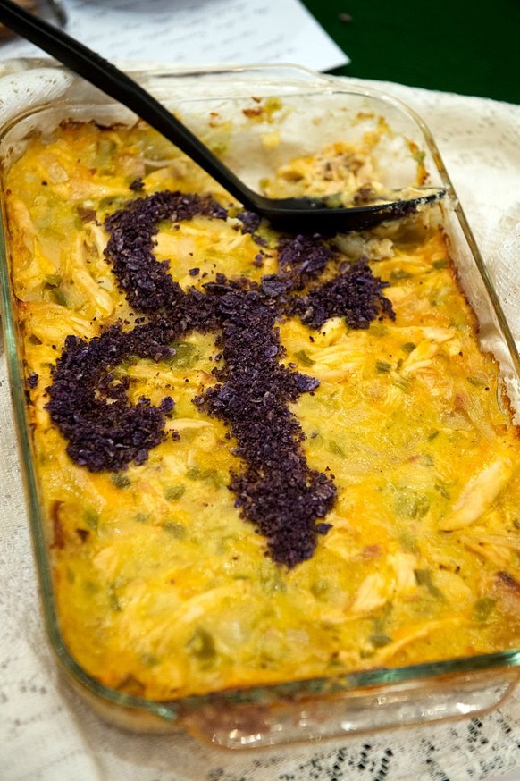 UNITED STATES - MAY 11: Sen. Al Franken, D-Minn., titled &quot;The Most Beautiful Hotdish in the World,&quot; named in honor of Prince, appears during the sixth annual Minnesota Congressional Delegati ...