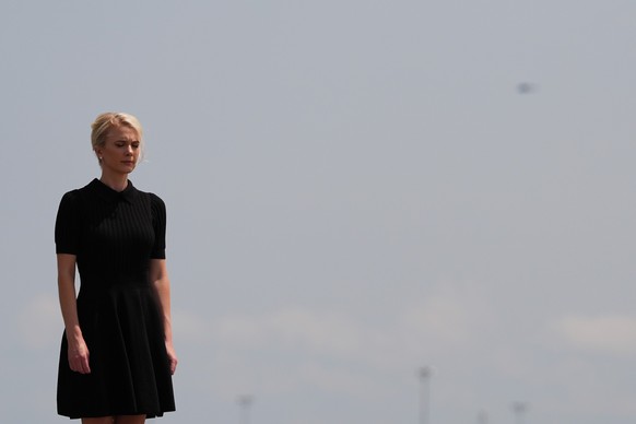 White House aide Natalie Harp attends a dignified transfer, Wednesday, July 22, 2026, at Dover Air Force Base, Del. (AP Photo/Julia Demaree Nikhinson)