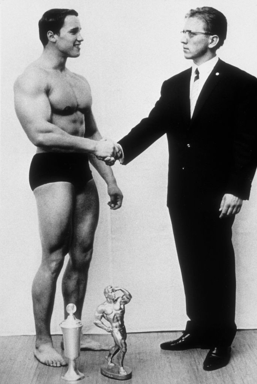 AUSTRIA - CIRCA 1966: Young bodybuilder Arnold Schwarzenegger wins a competition circa 1966 in Austria. (Photo by Michael Ochs Archives/Getty Images)