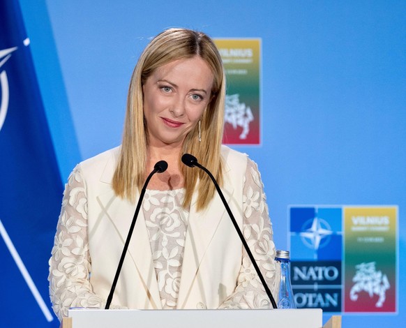 epa10742148 A handout picture made available by the Chigi Palace (Palazzo Chigi) Press Office shows Italian Prime Minister Giorgia Meloni holding a press conference at the end of the NATO Summit in Vi ...