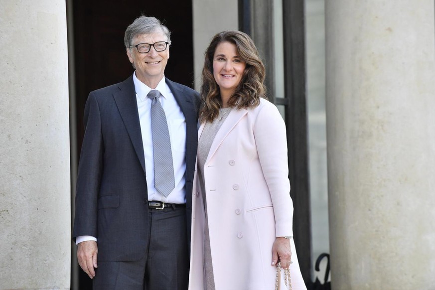 epa09176353 (FILE) - Microsoft Co-founder and philanthropist Bill Gates (L) and his wife Melinda Gates (R), Co-Chair of the Bill and Melinda Gates Foundation, arrive at the Elysee Palace to receive th ...