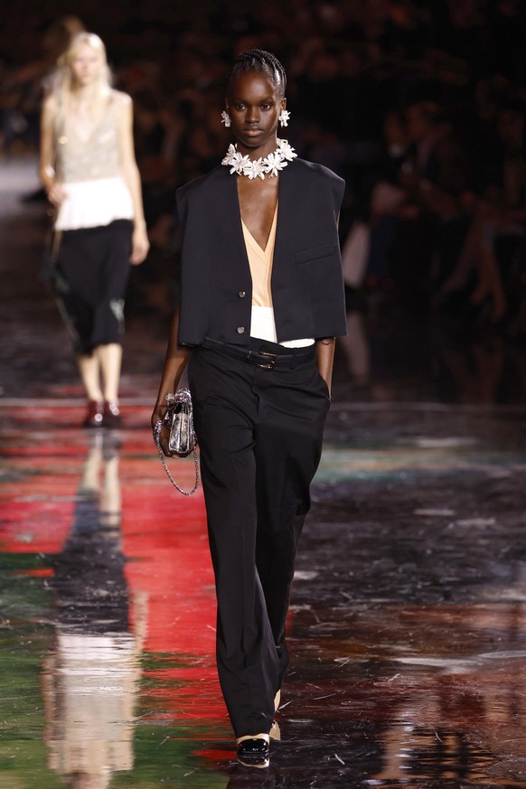 PARIS, FRANCE - OCTOBER 6: (EDITORIAL USE ONLY - For Non-Editorial use please seek approval from Fashion House) A model walks the runway during the Chanel Womenswear Spring/Summer 2026 show as part of ...