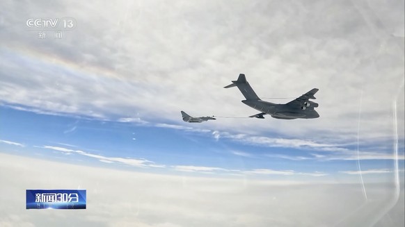 In this image taken from video footage run Saturday, April 8, 2023 by China&#039;s CCTV, a Chinese fighter jet performs an mid-air refueling maneuver at an unspecified location. The Chinese military a ...