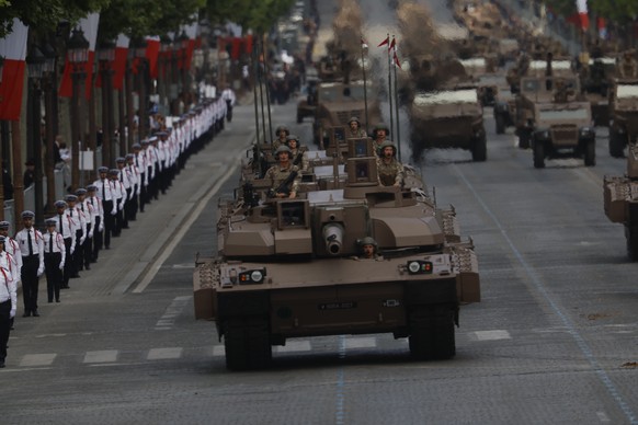 epa12237348 French Army Chars Leclerc XLR parade during the Bastille day celebrations in Paris, France, 14 July 2025. France celebrates its national holiday, or Bastille Day, annually on 14 July to co ...