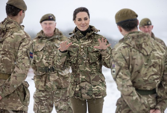 SALISBURY, ENGLAND - MARCH 08: Catherine, Princess of Wales meets personnel on exercise during her visit to the Irish Guards on Salisbury Plain, on March 8, 2023 in Salisbury, England. The Princess of ...