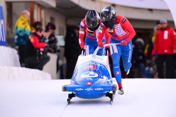 ST MORITZ, SWITZERLAND - FEBRUARY 03: Fontanive Martina, Morell Mara of Switzerland in action during the women&#039;s 2-man bobsleigh final of the BMW IBSF Bobsleigh and Skeleton World Championship 20 ...