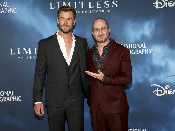 Actor Chris Hemsworth, left, and director Darren Aronofsky, right, attend the premiere of National Geographic&#039;s original series &quot;Limitless with Chris Hemsworth&quot; at Jazz at Lincoln Cente ...