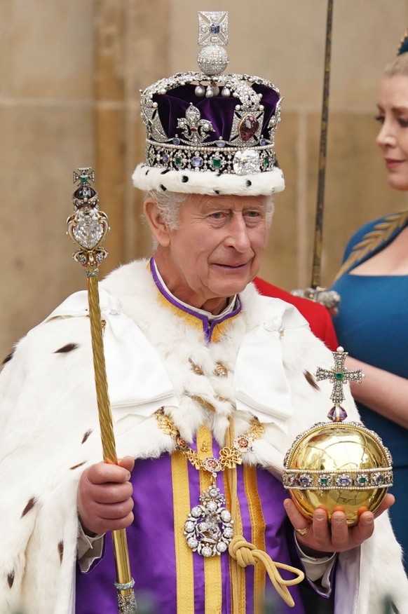 King Charles III, wearing the Imperial State Crown, leaves Westminster Abbey in central London following his coronation ceremony. Picture date: Saturday May 6, 2023. (Photo by Jacob King/PA Images via ...